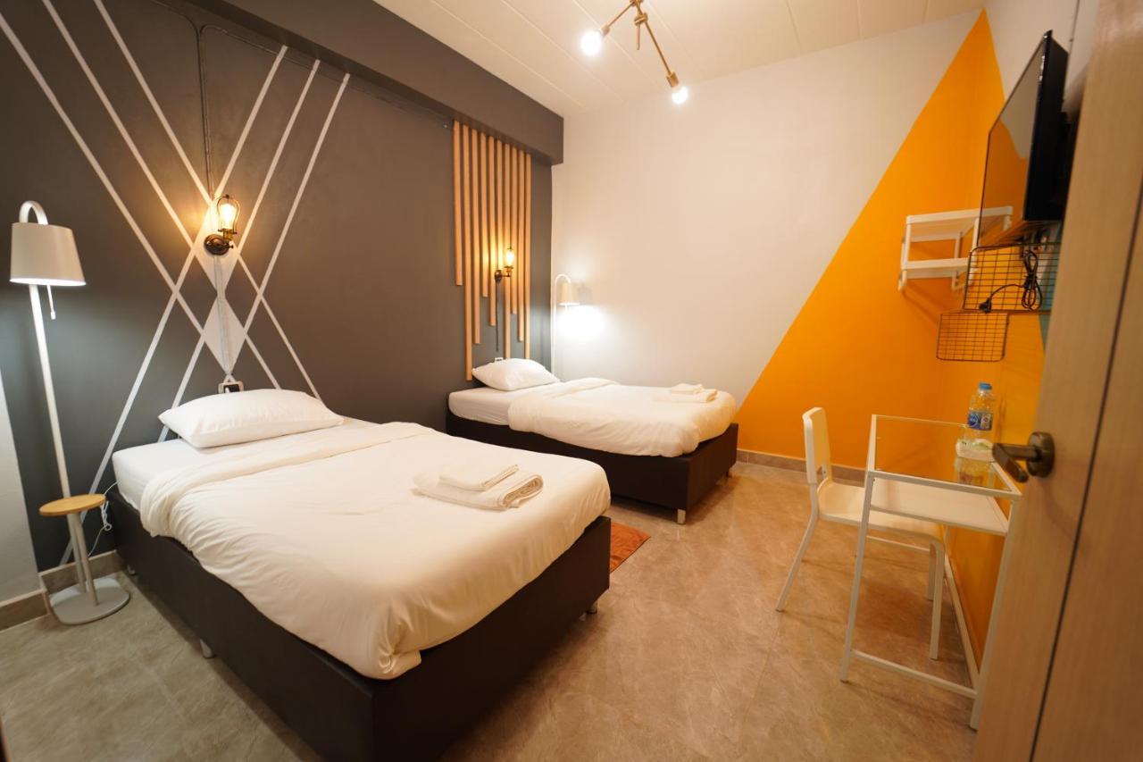 Tweepersoonskamer met 1 of 2 Bedden en Gedeelde Badkamer